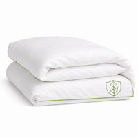 White comforter with green trim and logo on a white background