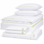 Anti-dust mite bedding set with white zip duvet cover, fitted sheet, pillowcases, and green zip mattress, duvet, and pillow encasements for complete allergy protection