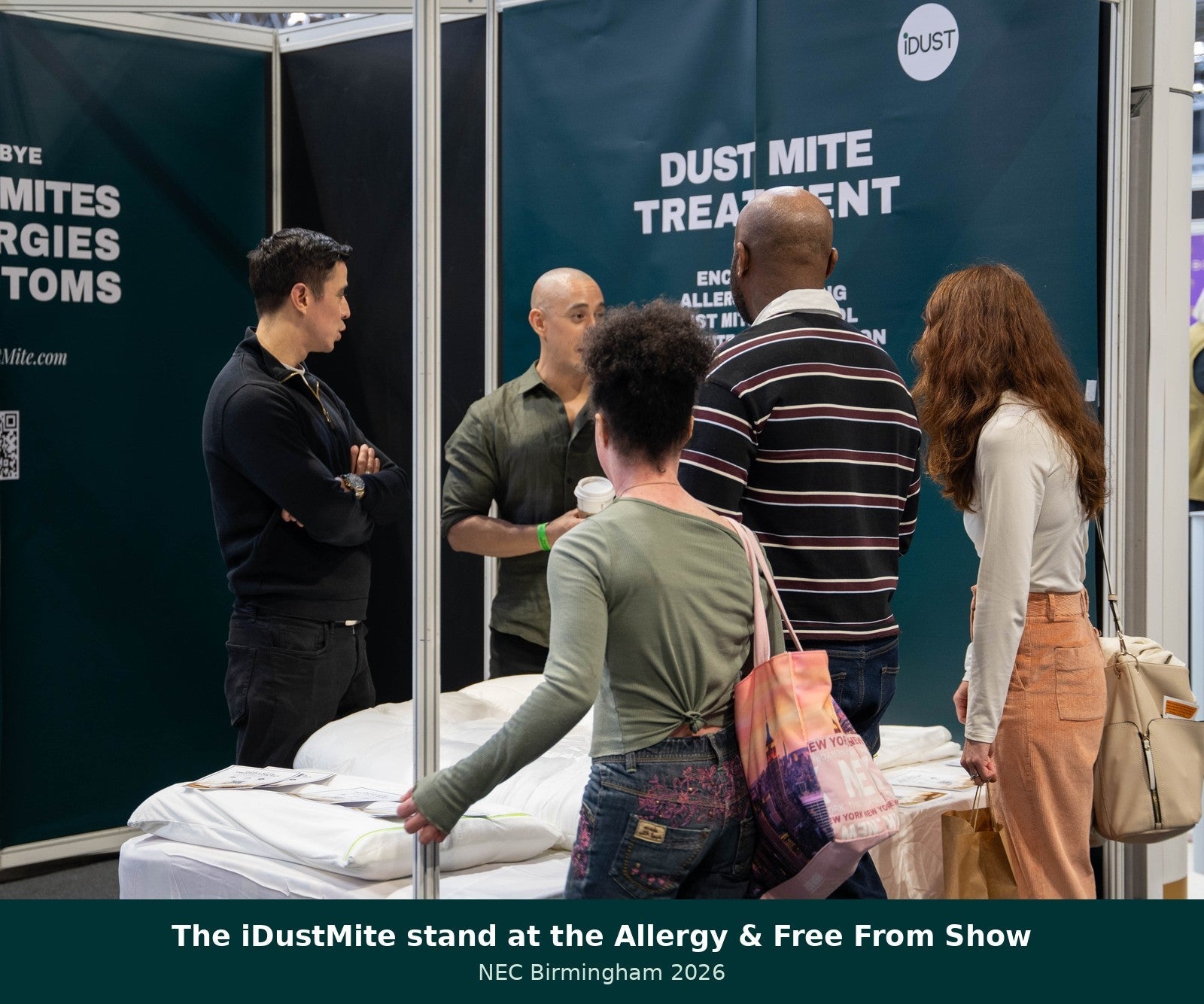 Visitors at the iDustMite dust mite treatment stand at the Allergy and Free From Show NEC Birmingham