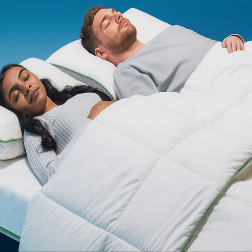 Couple sleeping under anti dust mite duvet cover for allergy relief