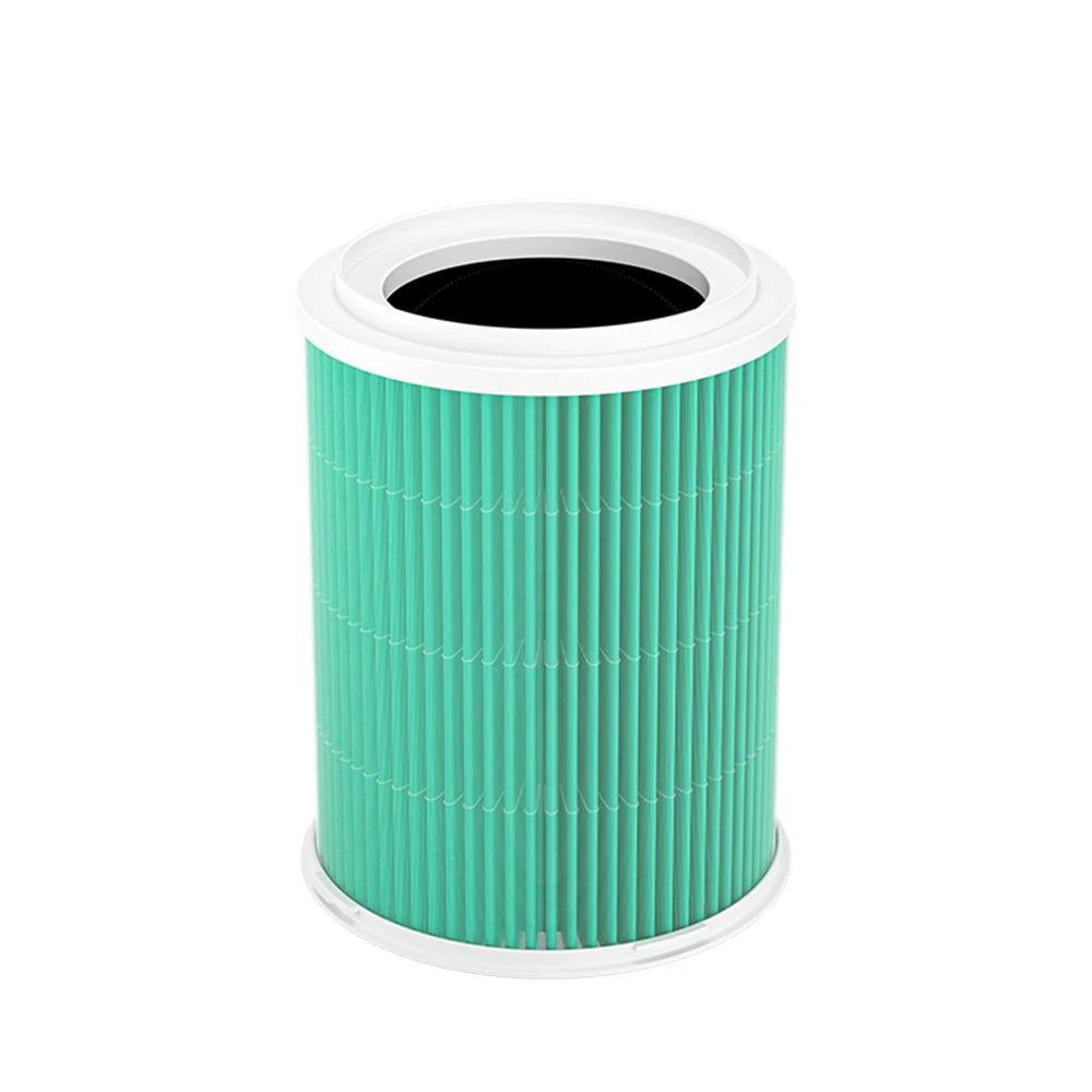 Studio view of the green True HEPA replacement filter cartridge, showing the 360-degree pleated glass fibre structure designed for maximum airflow and dust mite removal.